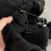 IMG_20261030_14802 Ruibang Apparel black cropped fleece hoodie adjustable drawcord hem detail