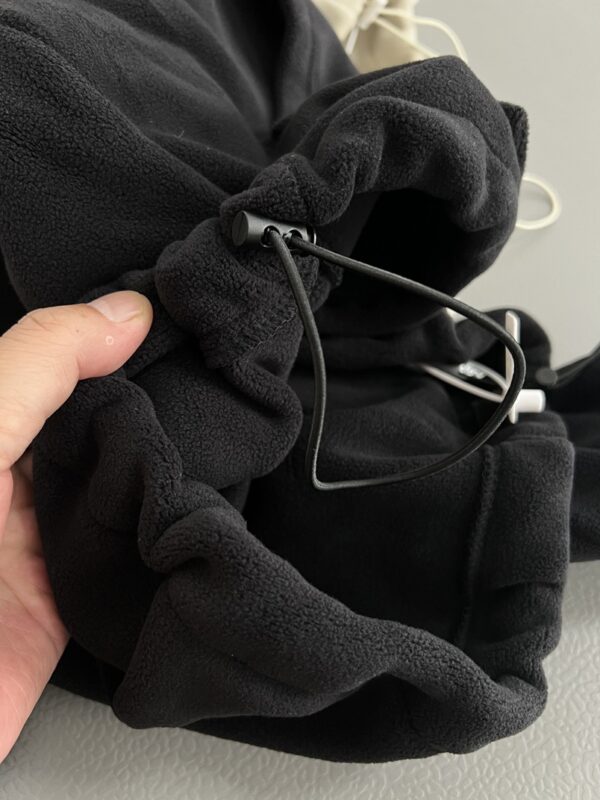 IMG_20261030_14802 Ruibang Apparel black cropped fleece hoodie adjustable drawcord hem detail