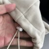 IMG_20261030_14803 Ruibang Apparel oatmeal cropped fleece hoodie soft fleece texture and drawstring detail